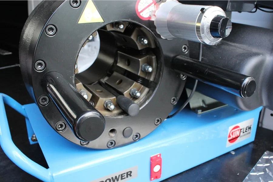 On-site hydraulic hose crimping with calibrated equipment.